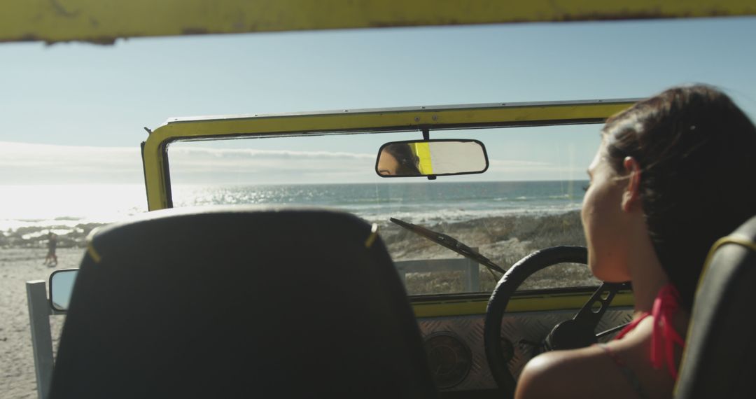 Young Woman Relaxing in Jeep by Beach - Free Images, Stock Photos and Pictures on Pikwizard.com