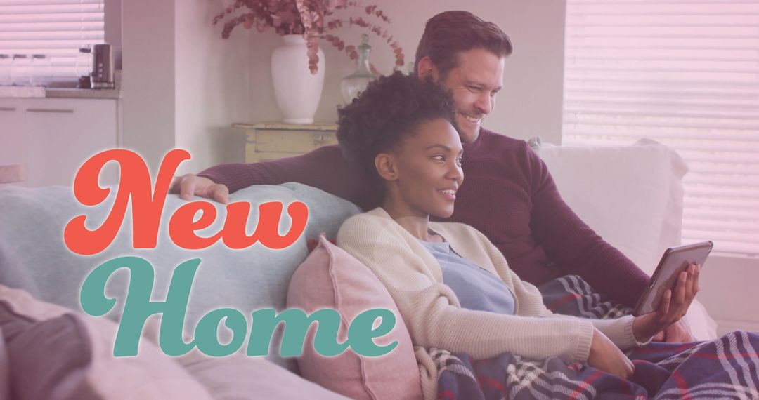 Diverse Couple Relaxing in New Home with Tablet