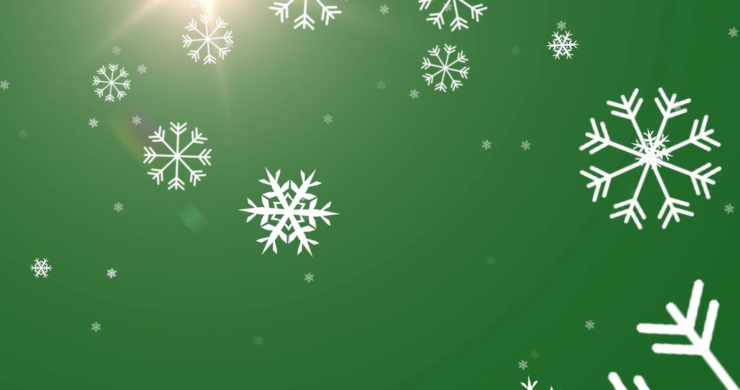 Snowflakes on Green Background with Bright Light