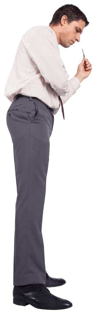 Focused Businessman Examining Pen with Curiosity on Transparent Background