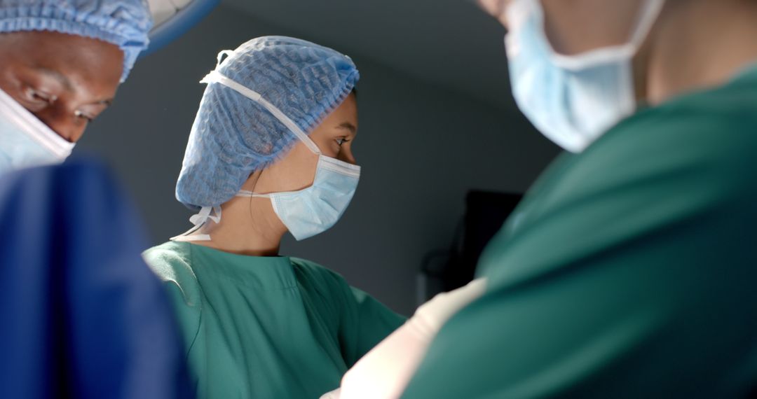 Surgeons in Action During Surgery Operation Teamwork