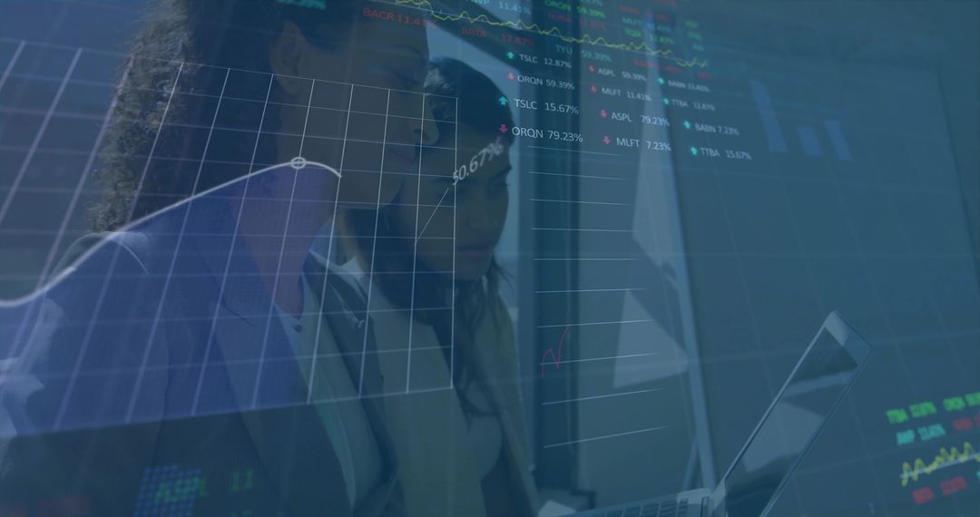 Colleagues Analyzing Financial Data on Digital Interface Overlay