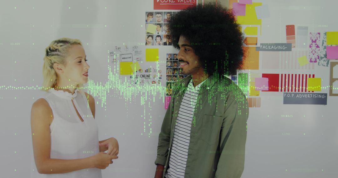 Creative Team Discussing Marketing Strategy With Digital Overlay