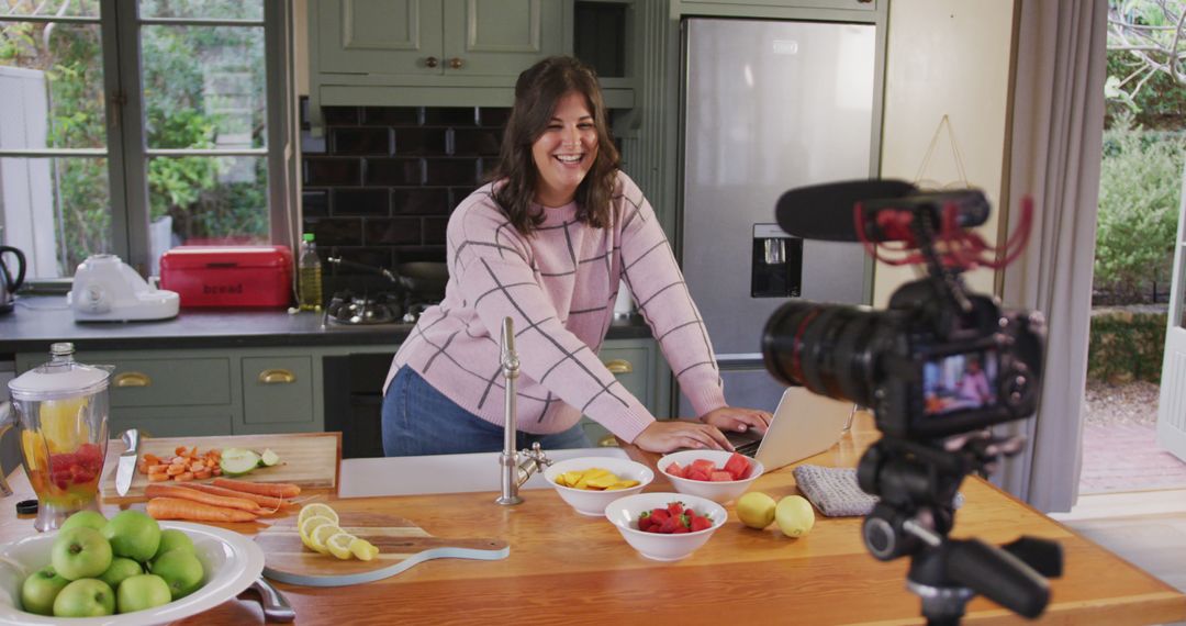 Woman Filming Cooking Vlog in Modern Kitchen - Free Images, Stock Photos and Pictures on Pikwizard.com