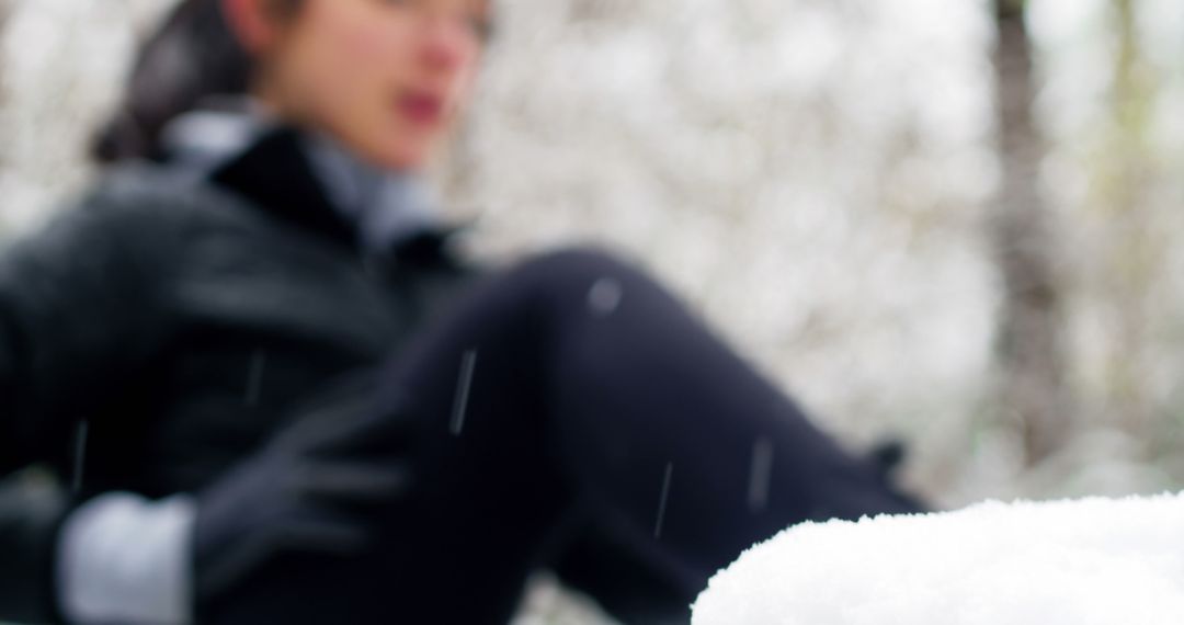 Focused Asian Woman Exercising in Snowy Weather - Free Images, Stock Photos and Pictures on Pikwizard.com