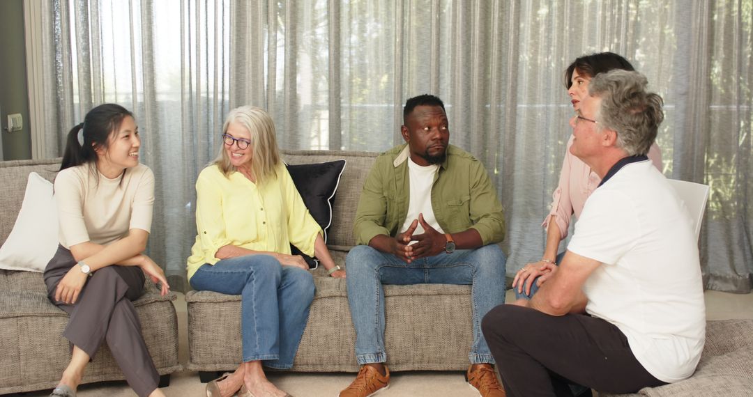Diverse Therapy Group Sharing Positive Interactions in Comfortable Setting