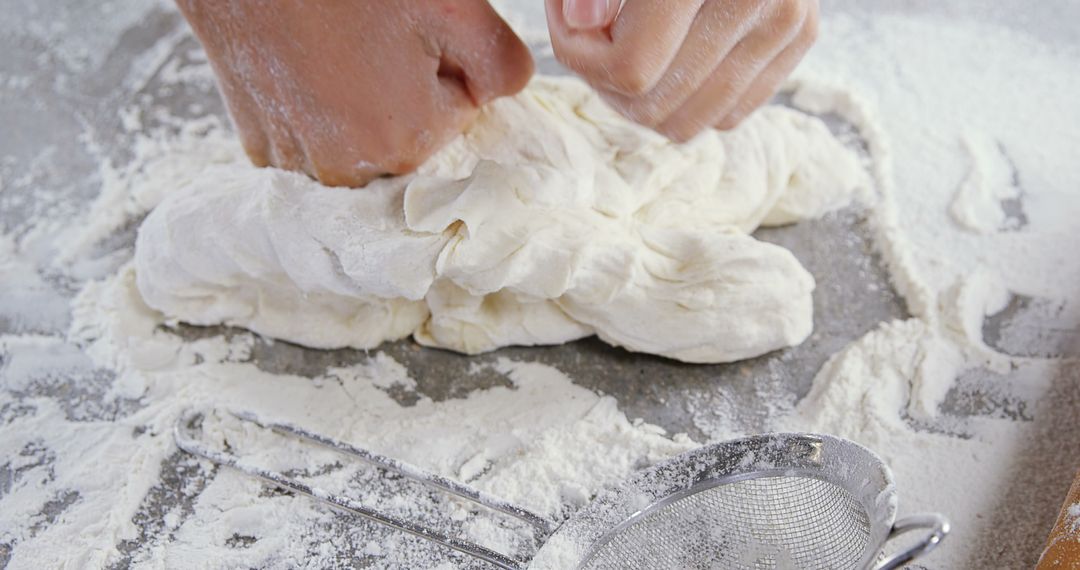 Close-up of Hands Kneading Dough on Floured Surface - Free Images, Stock Photos and Pictures on Pikwizard.com