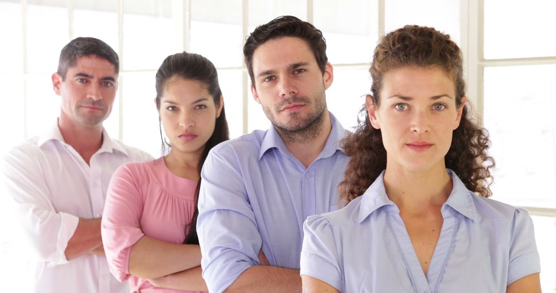 Diverse Creative Team Standing in Modern Office Environment