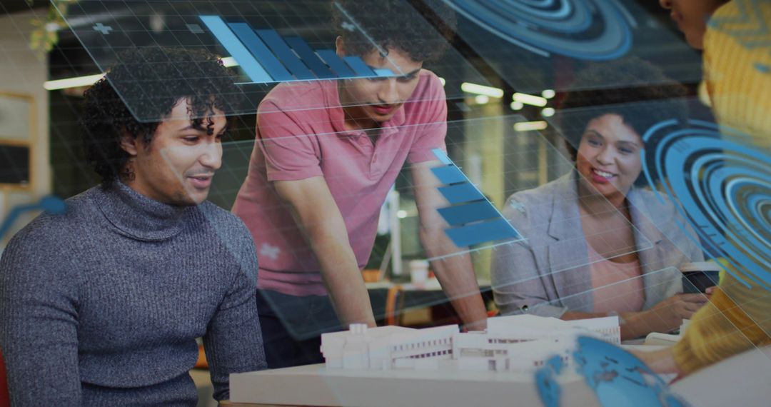 Startup team collaborating over architectural scale model with holographic AR overlays