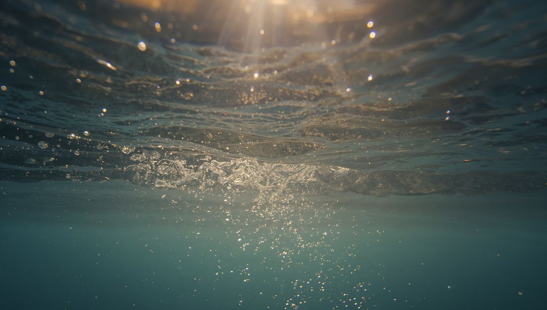 Glittering Sunlit Aquatic Bubbles Beneath Water Surface