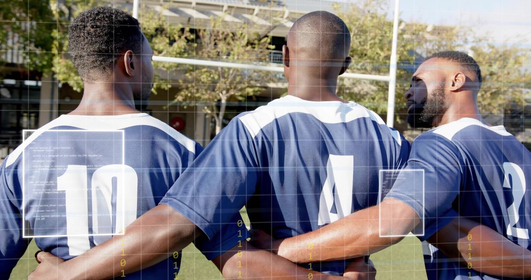 Linking Arms: Three Team Players Standing Together on Grass Wearing Navy Jerseys 10 4 2