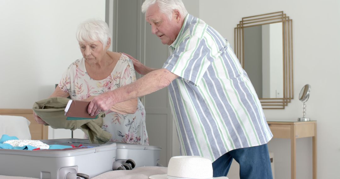 Senior Couple Packing Suitcase for Vacation in Bedroom - Free Images, Stock Photos and Pictures on Pikwizard.com