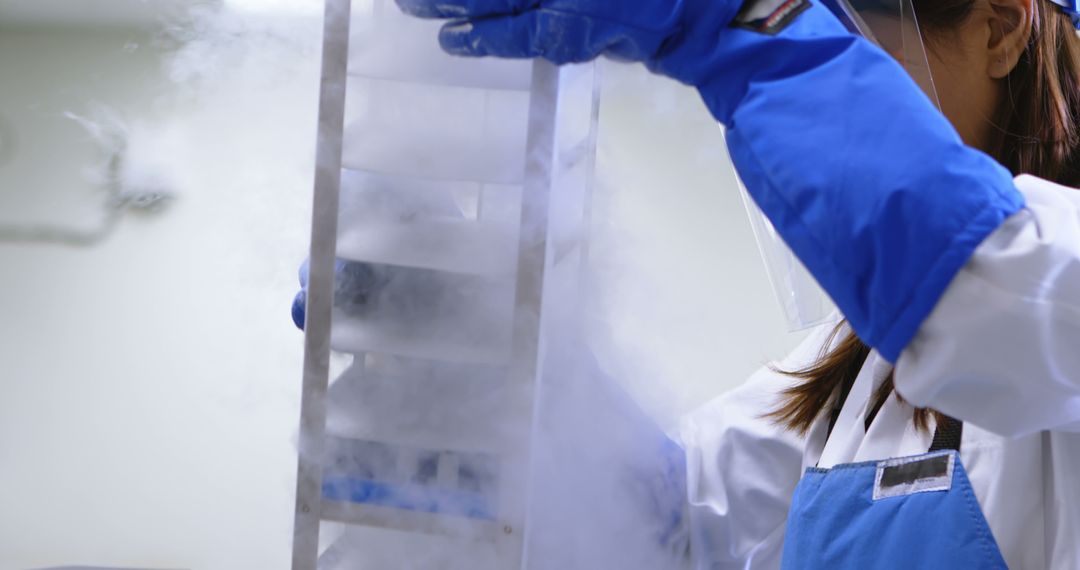 Scientist working with cryogenic storage - Free Images, Stock Photos and Pictures on Pikwizard.com