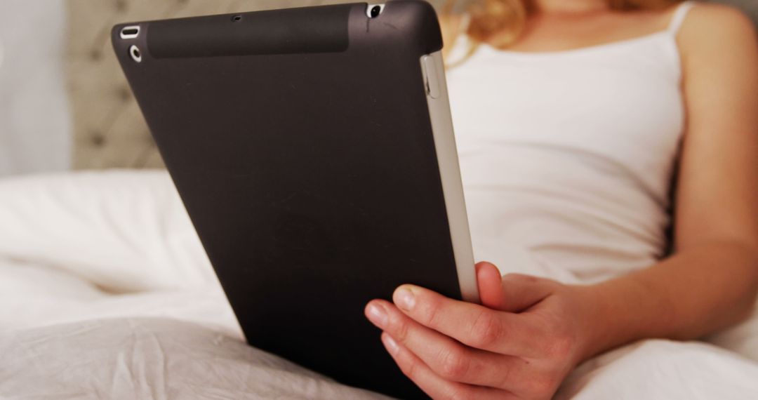 Woman Using Tablet in Bed - Free Images, Stock Photos and Pictures on Pikwizard.com