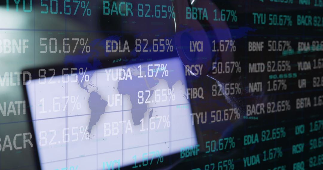 Man Navigating Map with Stock Ticker Display at Workstation