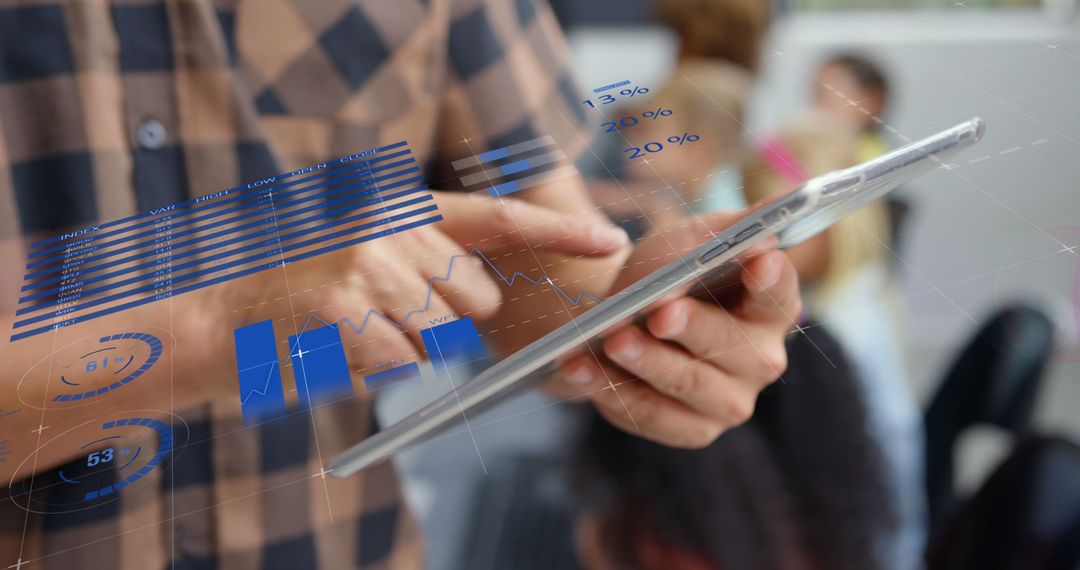 Person Analyzing Data on Tablet with Virtual Charts and Graphs - Free Images, Stock Photos and Pictures on Pikwizard.com