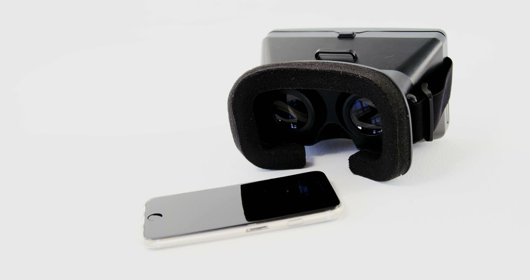 Virtual Reality Headset and Smartphone on White Background - Free Images, Stock Photos and Pictures on Pikwizard.com