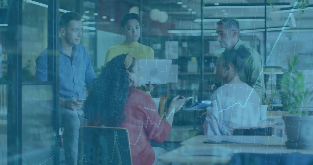 Team Discussing Financial Strategies in Modern Office with Technology