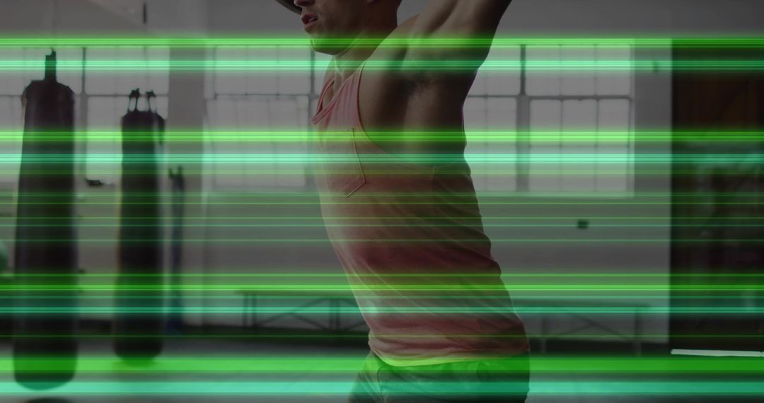 Man Stretching in Modern Gym with Neon Motion Effects