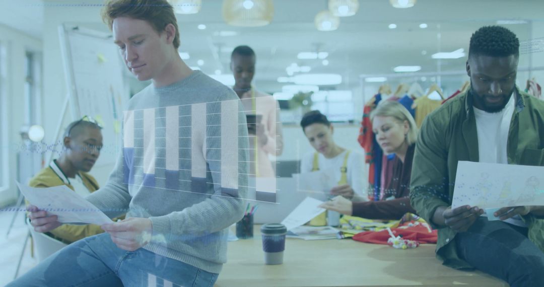 Creative Team Analyzing Data in Modern Office Environment