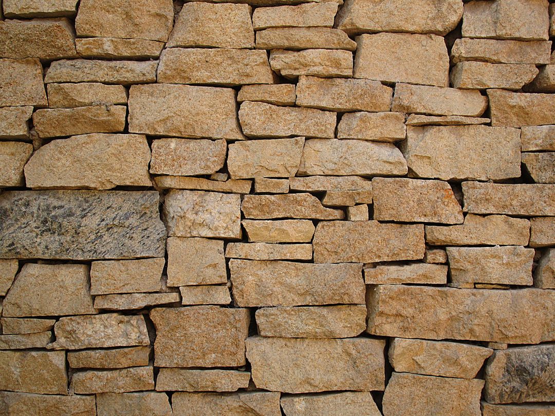 Detailed stone brick wall background with natural texture - Free Images, Stock Photos and Pictures on Pikwizard.com