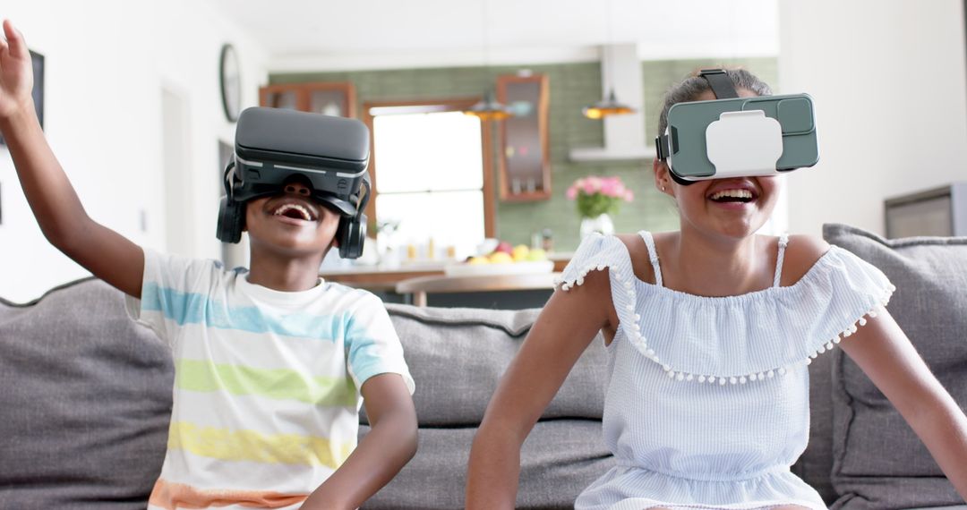 Excited Children Playing Virtual Reality Games in Modern Living Room - Free Images, Stock Photos and Pictures on Pikwizard.com