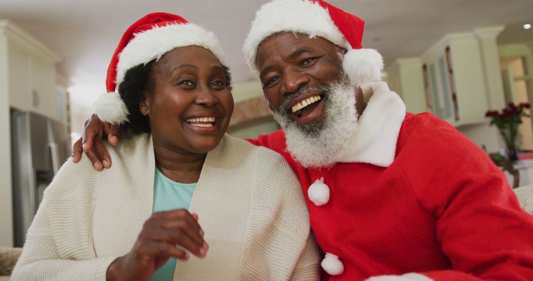 Happy African American Couple Celebrating Christmas in Festive Outfits - Free Images, Stock Photos and Pictures on Pikwizard.com