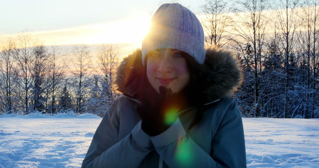 Woman Enjoying Winter Sunshine in Snowy Forest - Free Images, Stock Photos and Pictures on Pikwizard.com