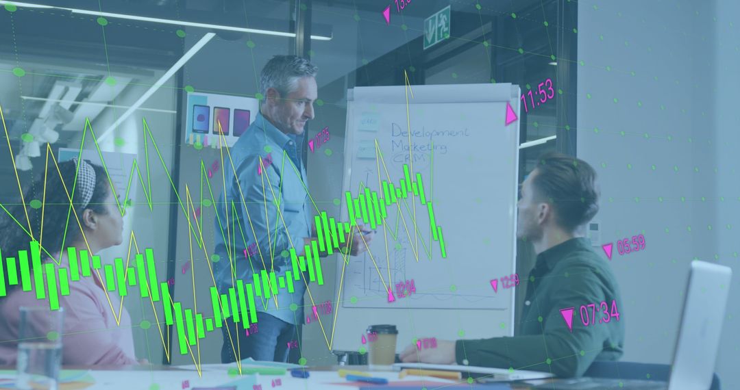 Team meeting discussing financial market trends with holographic graphs overlay - Free Images, Stock Photos and Pictures on Pikwizard.com