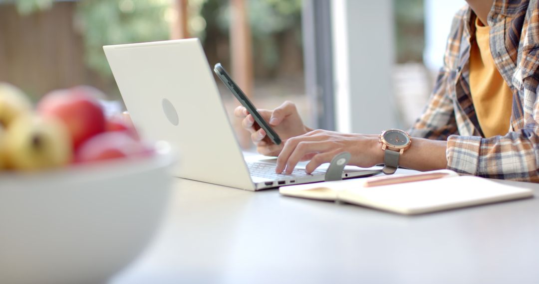 Remote Work Lifestyle Man Using Laptop at Home by Window
