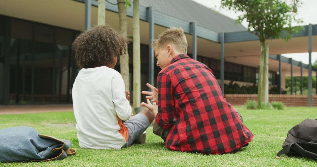 Diverse Children Communicating with Sign Language in Schoolyard