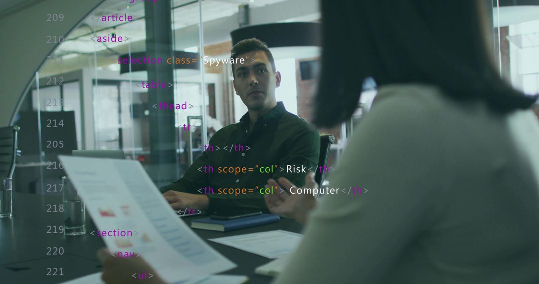 Office Team Collaborating on Data with Digital and Print Reports