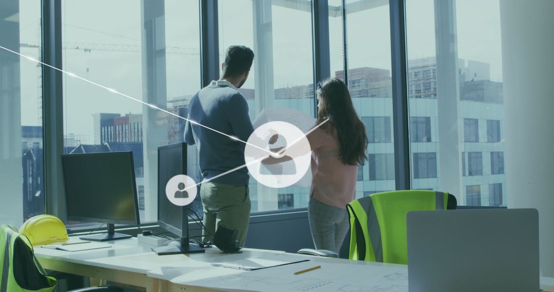 Architects Planning in Modern Office with Digital Interface