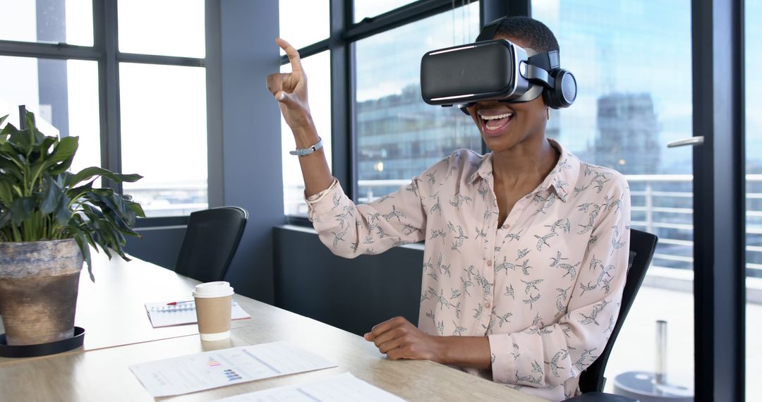 African American Businesswoman Using VR Headset in Office with Copy Space - Free Images, Stock Photos and Pictures on Pikwizard.com