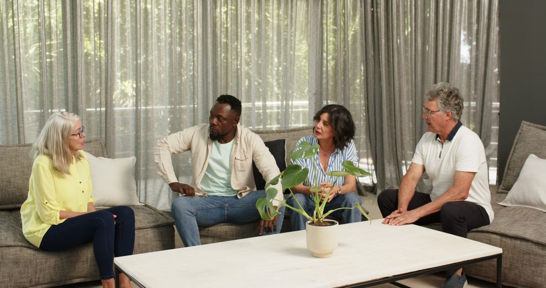 Diverse Colleagues Chatting in Modern Office Lounge