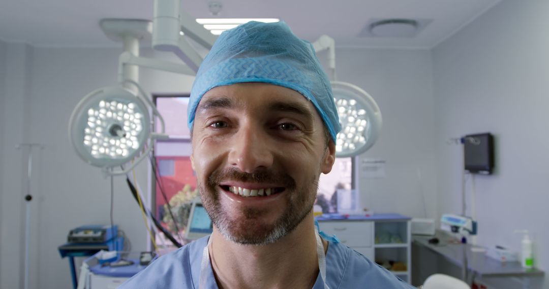 Confident Surgeon Smiling in Operating Room - Free Images, Stock Photos and Pictures on Pikwizard.com