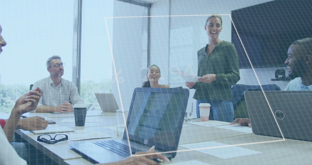 Diverse Business Team Analyzing Financial Data Insights in Modern Office