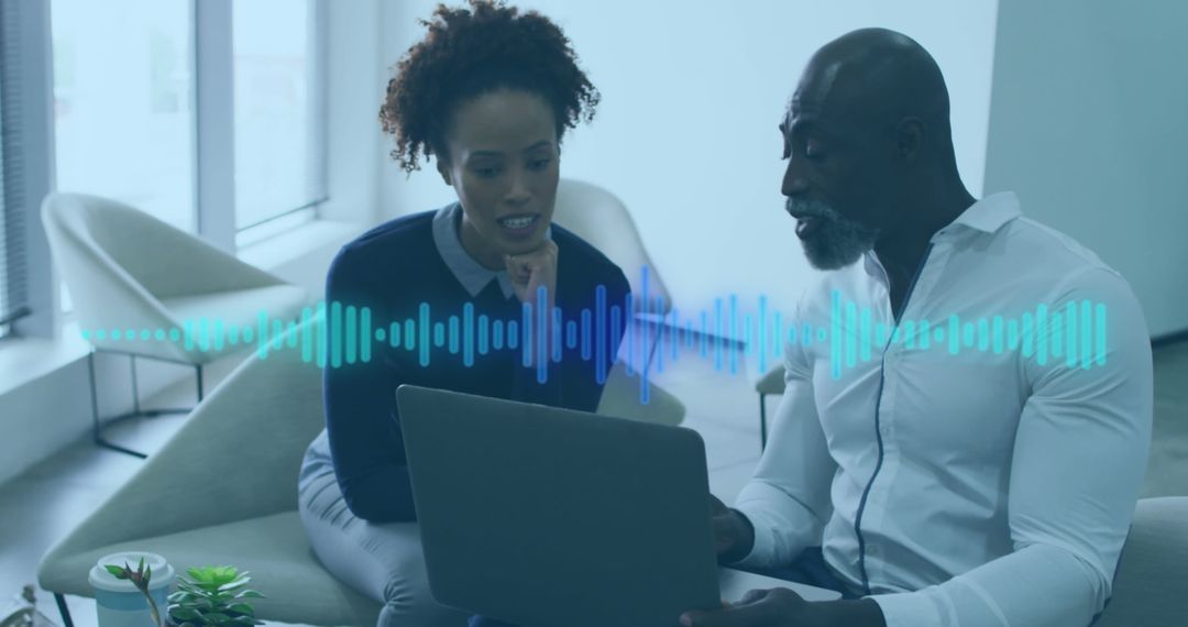 Business Professionals Discussing Technology with Music Visualization