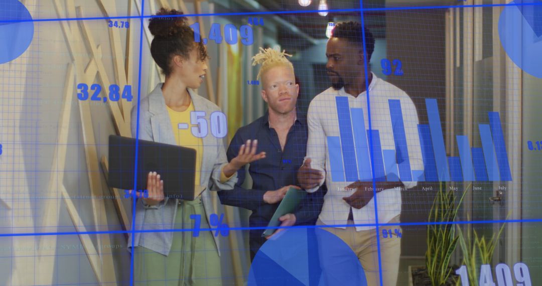 Diverse Coworkers Analyzing Data with Graphs and Statistics