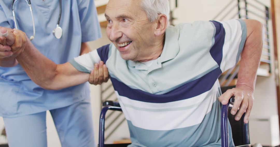 Image of happy biracial female doctor taking care of caucasian senior man - Free Images, Stock Photos and Pictures on Pikwizard.com