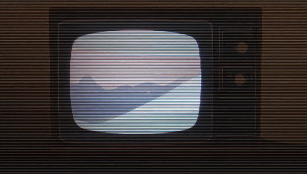 Retro CRT Television Showing Pastel Mountain Landscape with Visible Scanlines