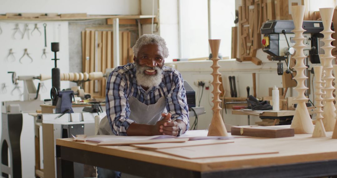 Senior Craftsman Smiling in Woodworking Workshop - Free Images, Stock Photos and Pictures on Pikwizard.com