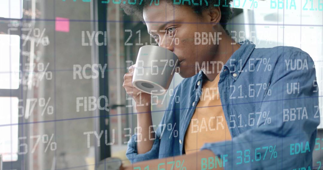 Focused Businessman Analyzing Digital Stock Data in Modern Office