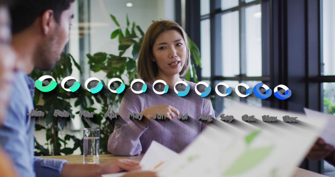 Diverse Team Analyzing Strategic Data During Business Meeting