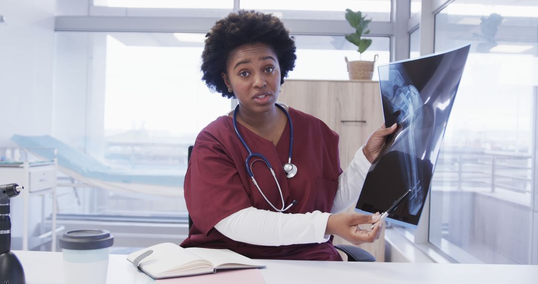 Medical Professional Examining X-ray in Office - Free Images, Stock Photos and Pictures on Pikwizard.com