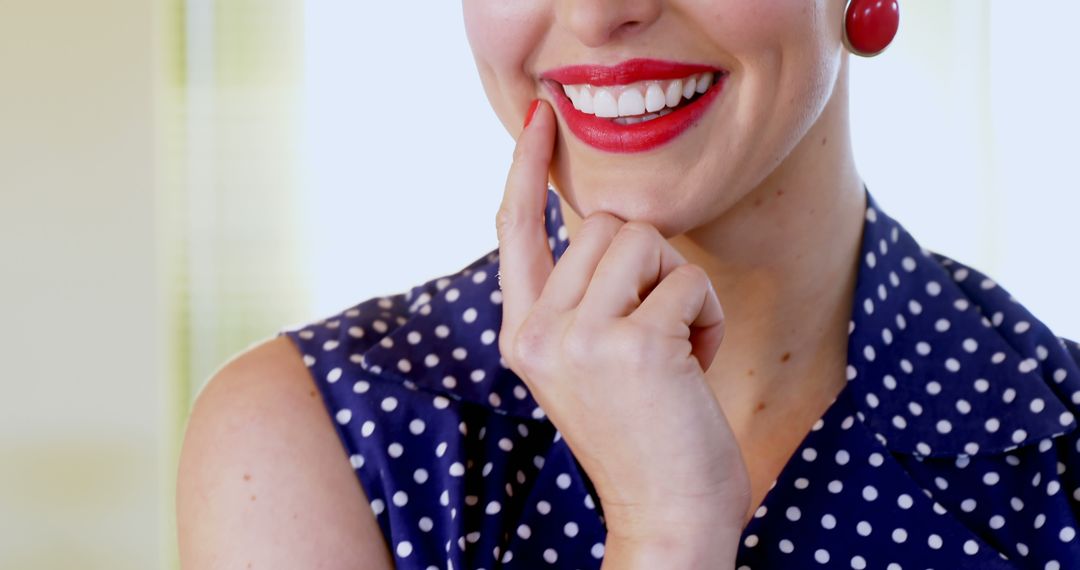 Close-up of Woman Smiling in Retro Polka Dot Dress with Red Lipstick - Free Images, Stock Photos and Pictures on Pikwizard.com