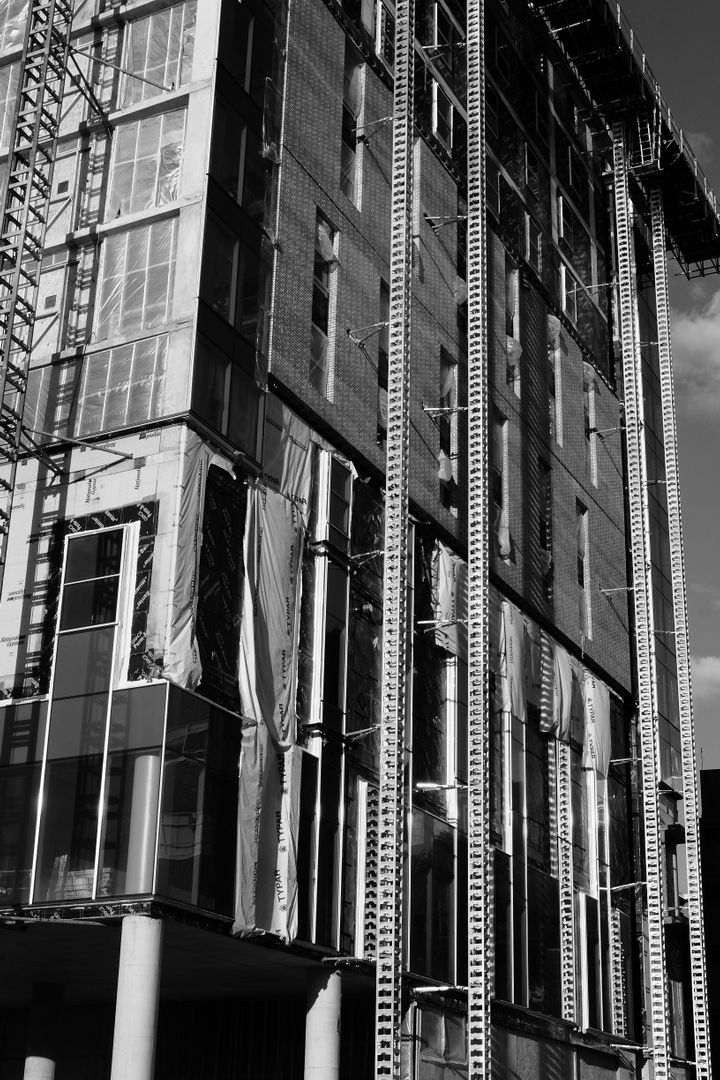 High-Rise Urban Building Under Construction in Black and White - Free Images, Stock Photos and Pictures on Pikwizard.com