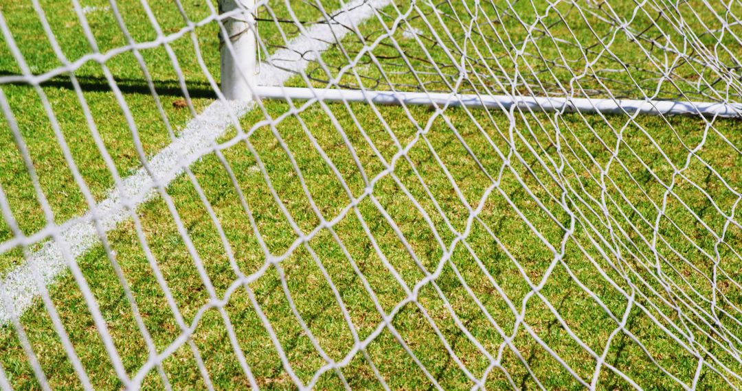 Soccer Goal Net Close-Up on Green Field - Free Images, Stock Photos and Pictures on Pikwizard.com