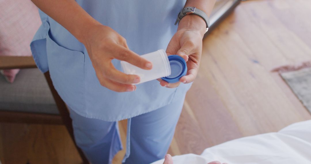 Nurse Preparing Medication for Patient in Health Care Setting - Free Images, Stock Photos and Pictures on Pikwizard.com