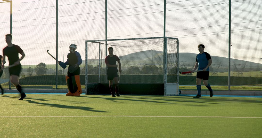 Field Hockey Players During Competitive Match on Turf Field